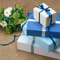 Stacked blue coloured gift boxes at a wedding