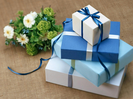 Stacked blue coloured gift boxes at a wedding