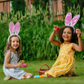 Two girls during Easter egg hunt
