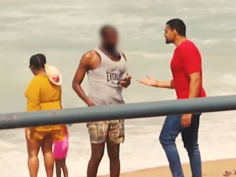 Two men chatting at Umhlanga beach