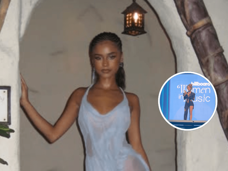 Tyla poses wearing a blue dress