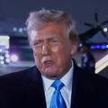US President Donald Trump speaking to a reporter