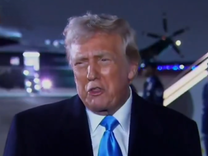 US President Donald Trump speaking to a reporter