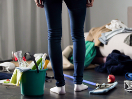 Woman horrified by mess in her apartment