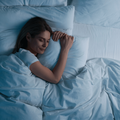 WOMAN_SLEEPING_IN_BED